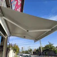 پرده/چادر جک دار/سایبان برقی/سایه بان دستی