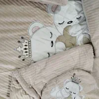 ست پنج تیکه و گهواره نوزاد