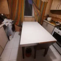 میز نهار خوری بدون صندلی وباند خورده وسیله