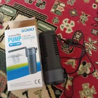 یک عدد فیلتر ماهی ویک عدد لباس بوکس