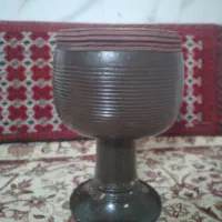 ضرب پوستی|سازهای سنتی|تربت‌حیدریه, میدان مرکزی|دیوار