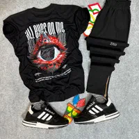 ست لباس برند چشم تیشرت و شلوار