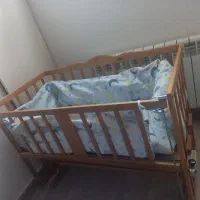گهواره کودک از جنس چوب گردو همراه تشک