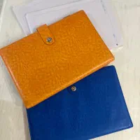 کلاسور چرمی با برگه اضافه