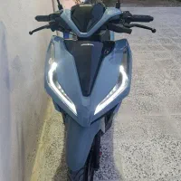 کلیک ۱۵۰i|موتورسیکلت|کنار تخته و کمار, |دیوار