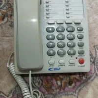 گوشی تلفن ثابت میکروتل و دستگاه پوزS90