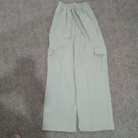 یه عدد شلوار کارگو نو رنگ کرم نخودی