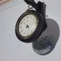 ساعت دو طرفه دیواری