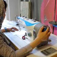 خیاط و بردست خیاط و بسته بندی