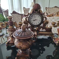 ساعت رومیزی دکوری همراه با شمعدان خارجی