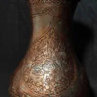 پارچ مسی‌ قلم زنی‌ شده