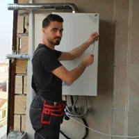 نصب کولر اسپیلت.نصب رادیاتور و تعمیرات پکیج