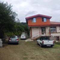 رستم آباد. ۱۰۰۰ مترباغ دو نیم طبقه مسکونی