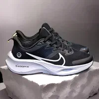 کتونی رانینگ ایر زوم مشکی سفید اسمایل 101