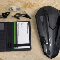 زین ترک عقب zx25rهمراه با دفترچه و پایه پلاک