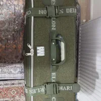 ساک بزرگ مسافرتی|کیف، کفش، کمربند|مهاجران, |دیوار