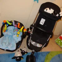 کالسکه و کریر  مکسی کوزی تخت کنار مادر روروئک