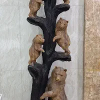 مجسمه خرس  و شیر چوبی