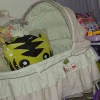 گهواره کنار تخت مادر