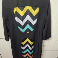 تعدادی مانتو،بارونی،کت،رومیزی،شال