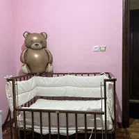 تخت گهواره ای کنار مادر