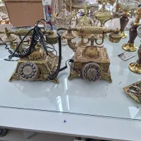 دوتا تلفن و میز تلفن