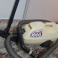 جاروبرقی ناسیونال و دوچرخه ثابت ورزشی