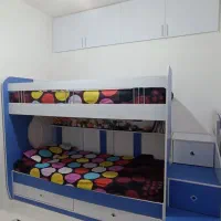 تخت دو طبقه و میز تحریر