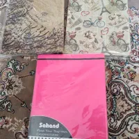 تعدادی دفتر و لوازم تحریر