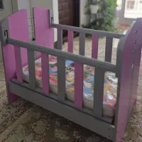 تخت نوزاد حالت گهواره ای