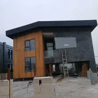 نصب چوب ترمو نما ساختمان سازنده پله گرد با پلی وود|خدمات پیشه و مهارت|رشت, منظریه|دیوار