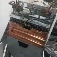 آبگرمکن بوتان ۳۲۱۸ بدون شمعک سالم و تمیز