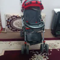کالسکه تاشو قرمز مشکی اسپرت