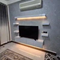 طراحی و تولید انواع تی وی وال و میز تلوزیون سفارشی