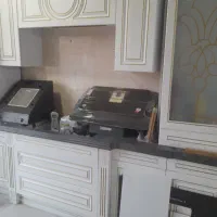 کابینت پلی اورتان سفید طلایی کمد یواری