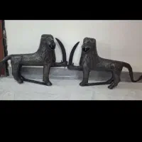 شیر علامت‌ نقره کوب. گوزن