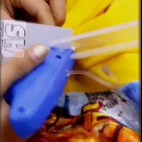 کارگر ساده تولیدی لباس بچگانه