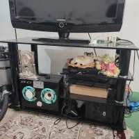 میز تلویزیون شیشه‌ای
