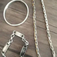 گردنبندودوتا دست بند استیل