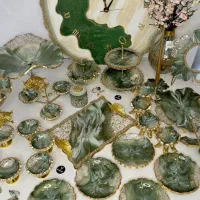 ظروف پذیرایی و ساعت رزینی