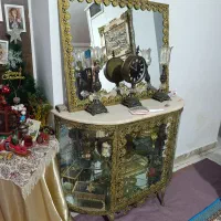 آینه کنسول برنزی و بوفه و ساعت ایستاده