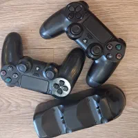 2عدد دسته ps4.  به همراه پایه شارژر