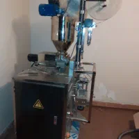 دستگاه بسته بندی تکنفره پودری