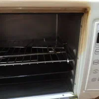 یک دستگاه فر برقی مدل کاپریسی کار کرده