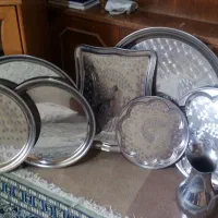 7 عدد سینی و1 پارچ استیل نو قیمت 10 تومان