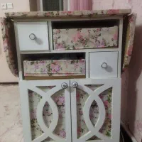 تخته اتو و جای چرخ خیاطی