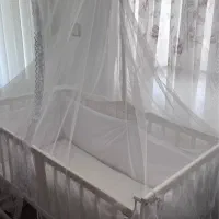 تخت کنار مادر