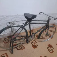 دوچرخه قدیمی و کپسول گاز|دوچرخه، اسکیت، اسکوتر|بن, |دیوار