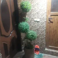 درختچه مصنوعی با گلدان حصیری