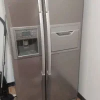 یخچال ، فرش ، تلویزیون ، باند ، آینه و شمعدان